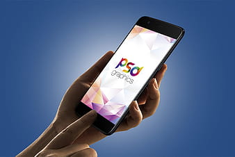 Smartphone in Hand Mockup Free PSD psd vector